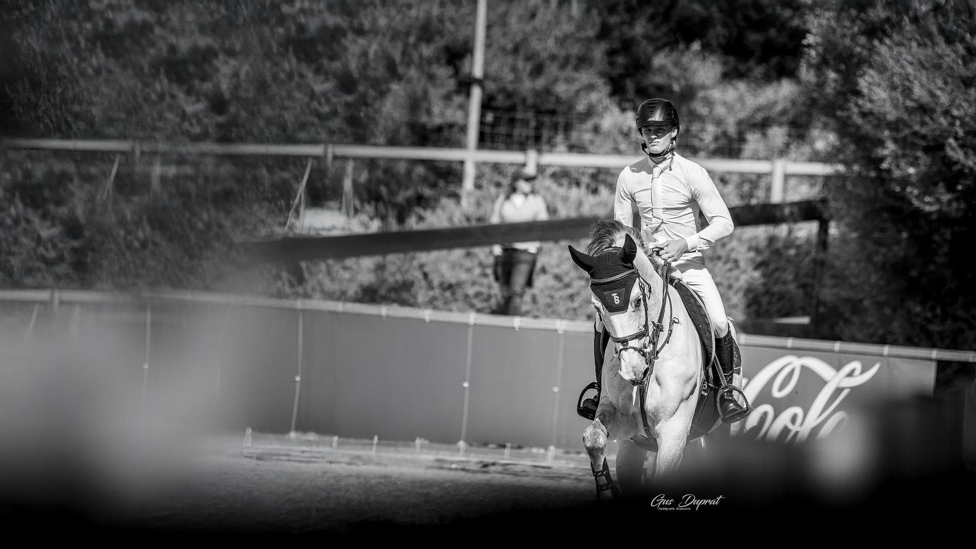 Tom Schewe riding in the arena